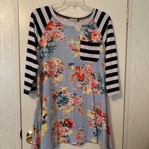 ‘Nuggles light blue floral top